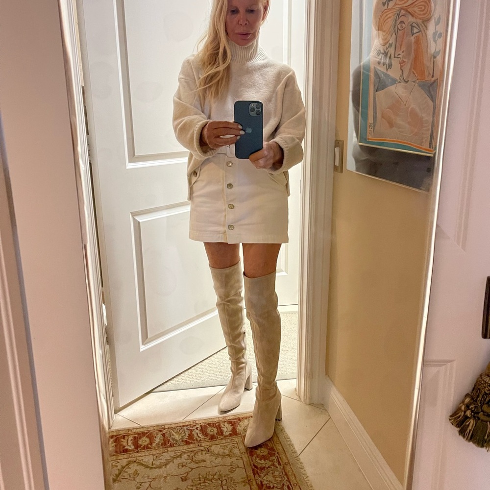 Warm lined white jacket s with white cotton sweater and skirt